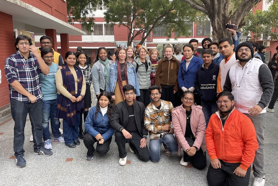 M.A. student Alison Guerrero with her cohort and students from Delhi University in India