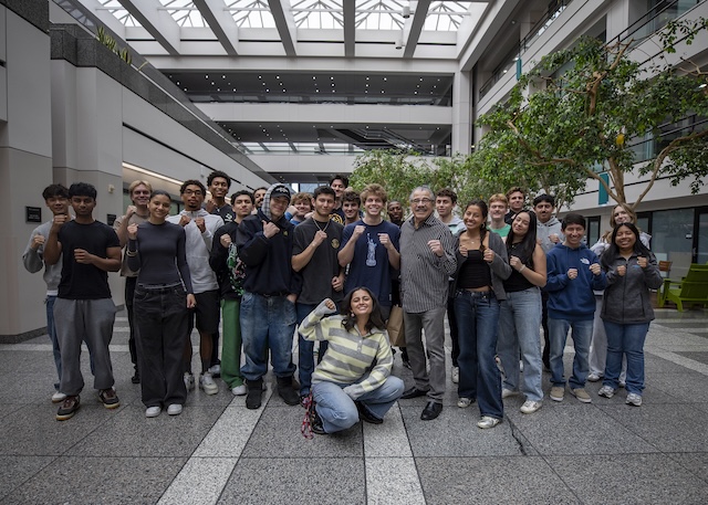 Students in boxing pose with Jacob Stitch Duran