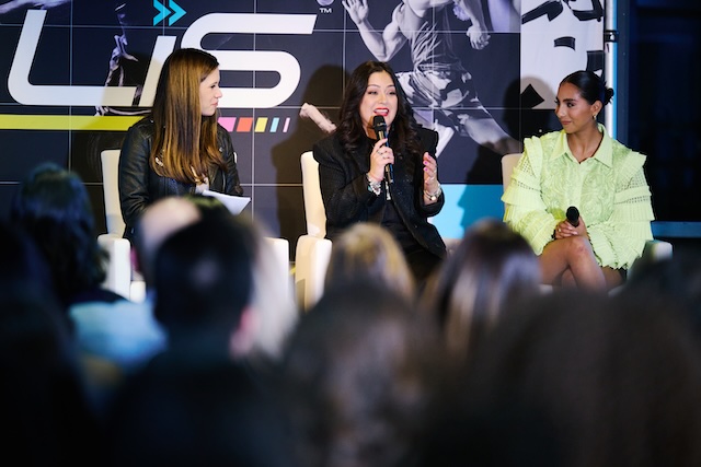 Panel of Latina sports journalists, professionals, and athletes engaged in conversation