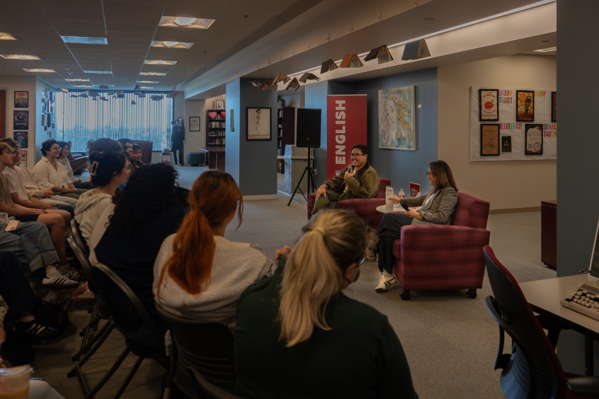 Randall Park in English Village speaking with students
