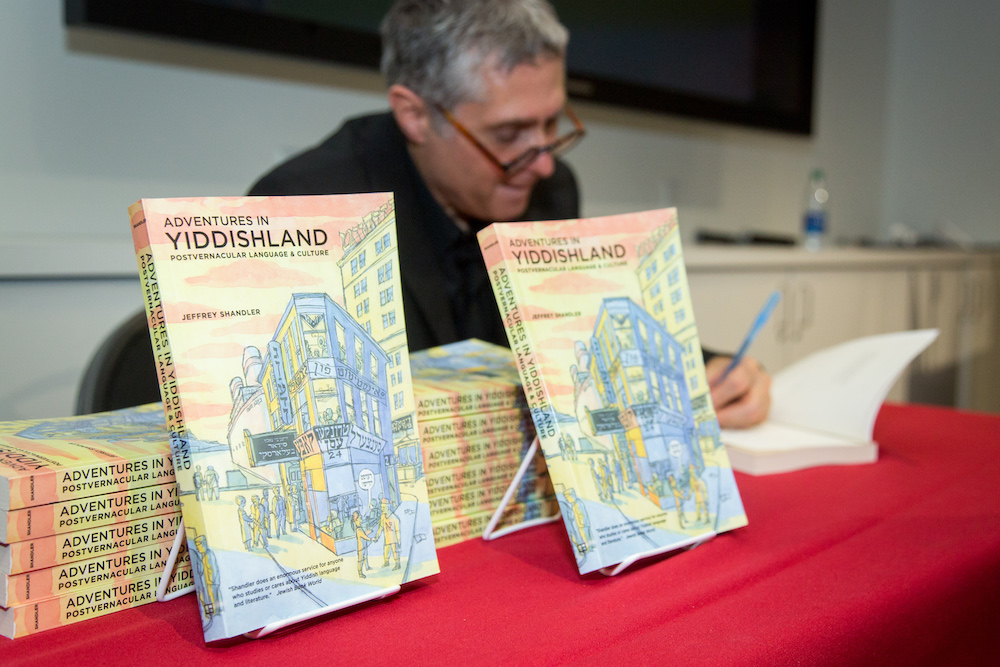 Jeffrey Shandler signing copies of his book