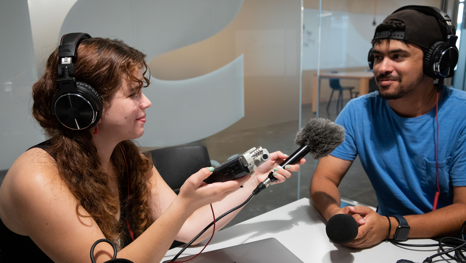 Journalism students learning audio