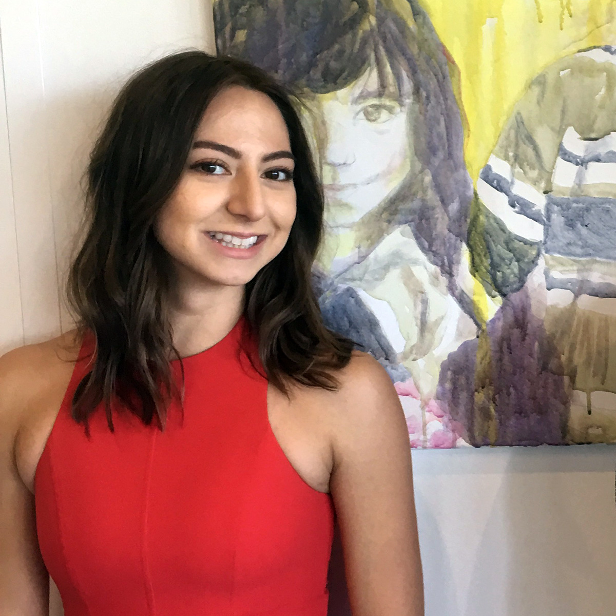 Alejandra Hernandez in front of painting