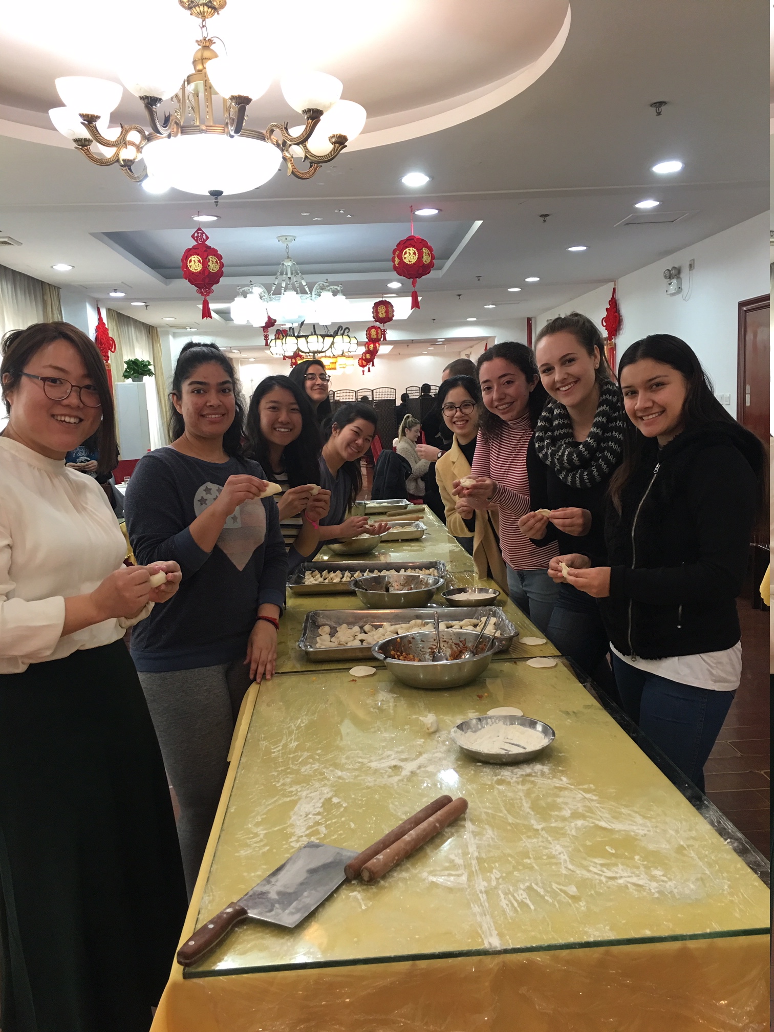 China Immersion students participate in kneading dough. 