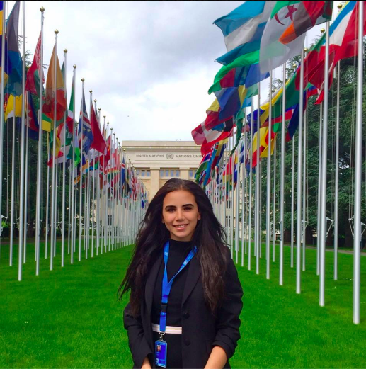 Nadine Iskandar in front of UN flags