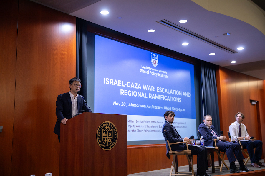 A Professor introducing a speaker