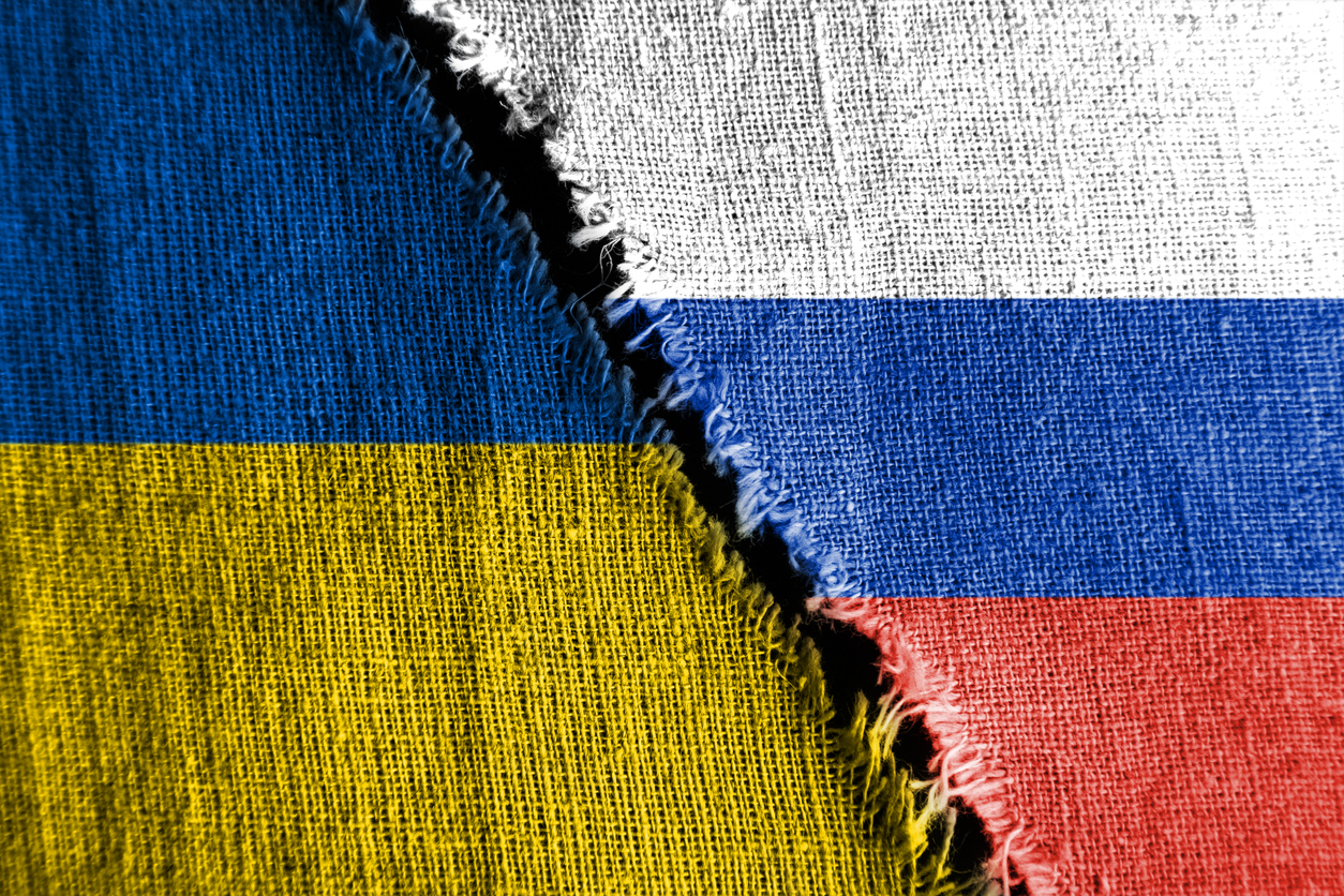 Ukraine Russia torn flags